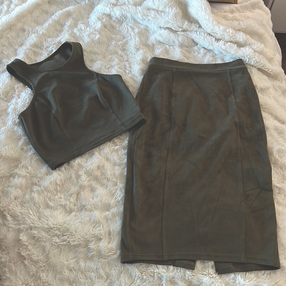 Olive green suede crop top with matching skirt.